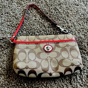 Coach wristlet for sale slightly used. Got as a gift and did not use much.